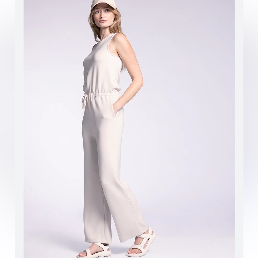 Thread and Supply Sleeveless Wide-Leg Jumpsuit in Cream.